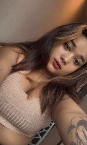 Sexy brunette with long legs and a beautiful face.